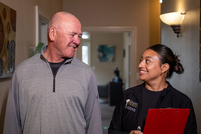 patient smiling at team member