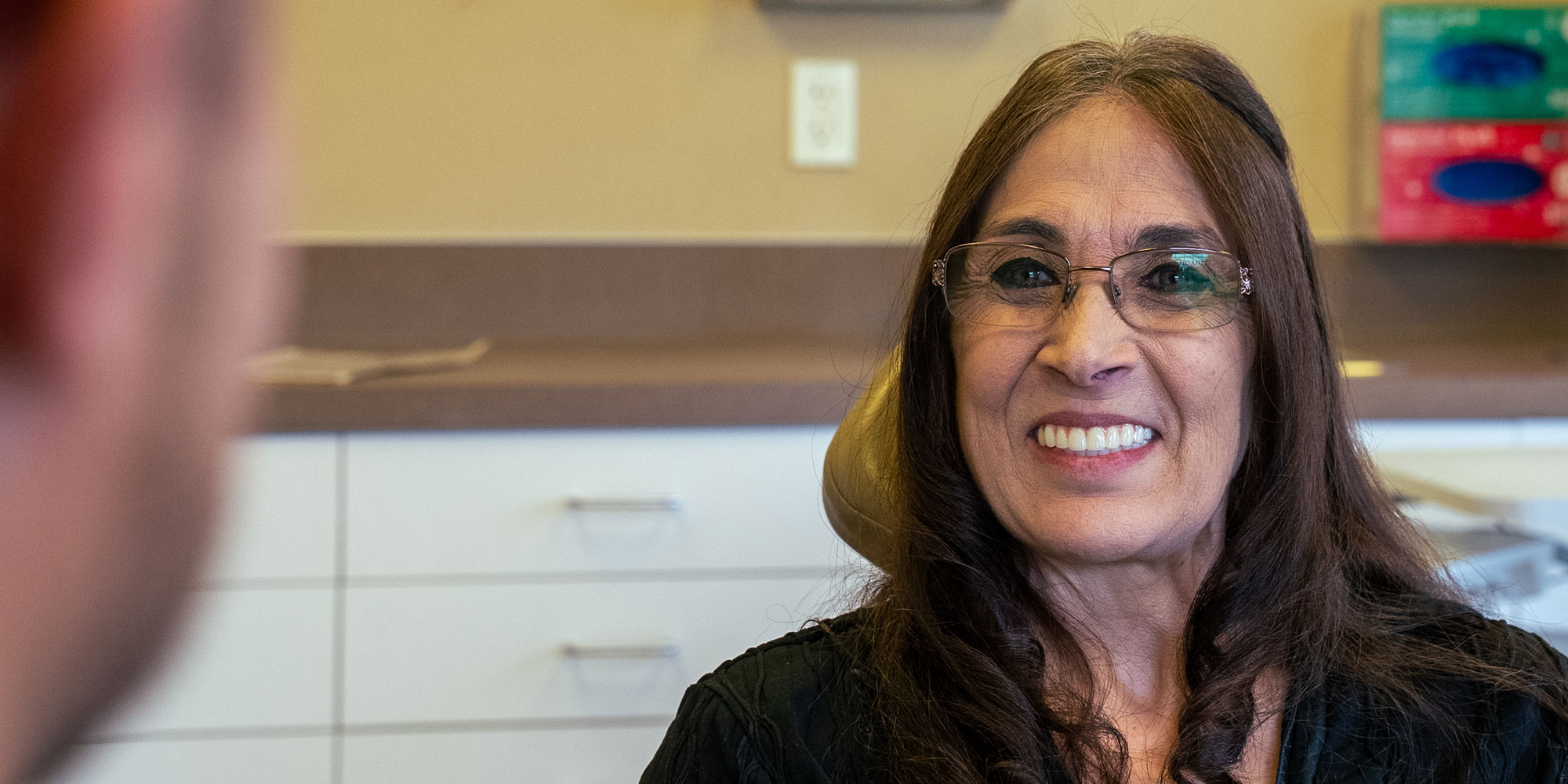 patient smiling at doctor