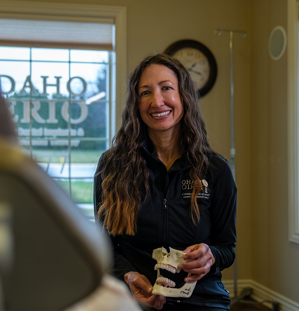 dental staff member going over dental procedure information
