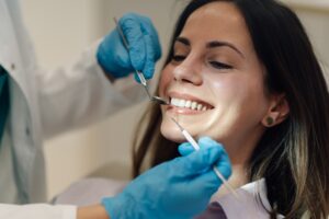 Dentist and dental props working in a dental office, dental props and dentist posing for a photo.